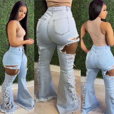 China 2021 Fashion Breathable Bell Bottom Hollow Out Denim Pants Sexy High Waist Ripped Rocket Jeans Pants Women for sale