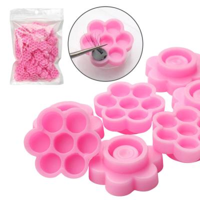 China Wholesale Kissure 100pcs/bag Color Eyelash Extension Layout One Second Sun Flower Blooming Glue Cup For Eyelash Glue Holder for sale