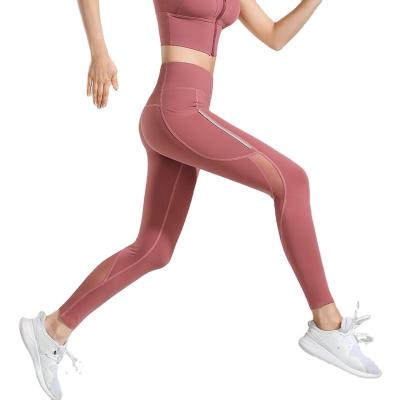 China Breathable Sexy Gym Yoga Leggings With Pocket Athletic Wear Sports Wear Fitness Pants for sale