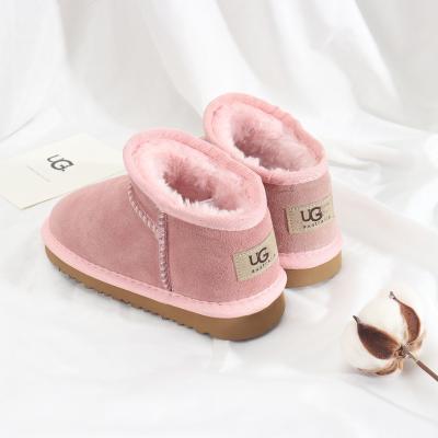 China UG2022 deodorization warm fashion temperament plush children's new trend woolen leather children's snow boots UG039 for sale