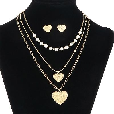 China Customizable Fashion 4 Pcs Layered Necklace Earrings Gold Multi Layered Necklace Stainless Steel for sale