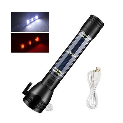 China Multifunction Solar Flashlight USB Rechargeable Solar Powered Tactical Flashlight with Glass Breaker Seatbelt Cutter Torch light for sale