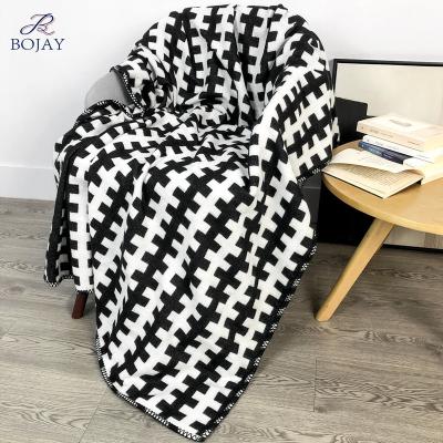 China PORTABLE Nordic Style Plaid Throw Blanket For Sofa Couch Soft Flannel Fleece Decorative Checker Throw Black White Plaid Pattern for sale