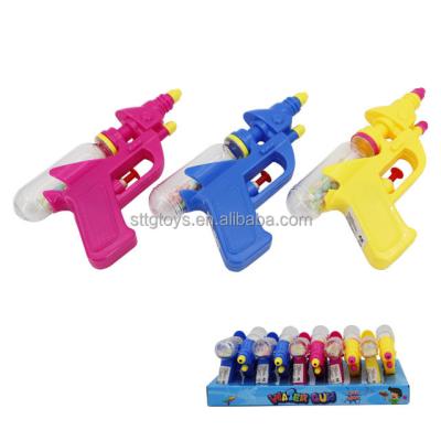 China Cartoon toys sale children toys summer outside water gun with candy for kids for sale