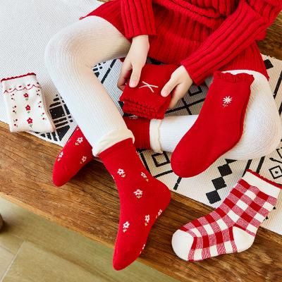 China Sporty winter flower thickening baby vermilion socks in the tube cotton socks new year children's socks for sale