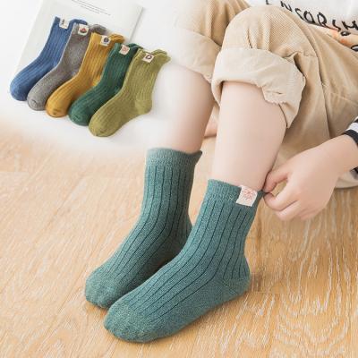 China Sports Children's Tube Socks Double Yarn Cotton Socks In Tube Cloth Label Socks Casual Sports Socks Boys And Girls Socks Boxed Kids for sale