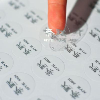 China Waterproof Custom Print Around Adhesive Clear Transparent Vinyl Label Sticker for sale