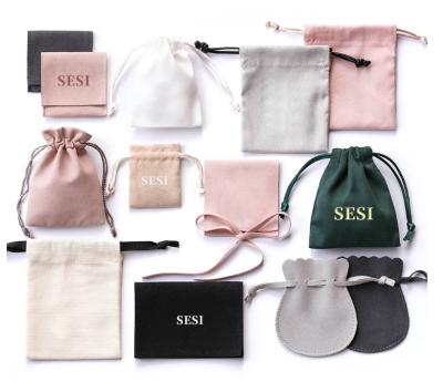 China Simple Modern Custom Made Jewelry Pouch Hot Stamped Microfiber Suede Wrap Jewelry Pouch With Jewelry Box for sale