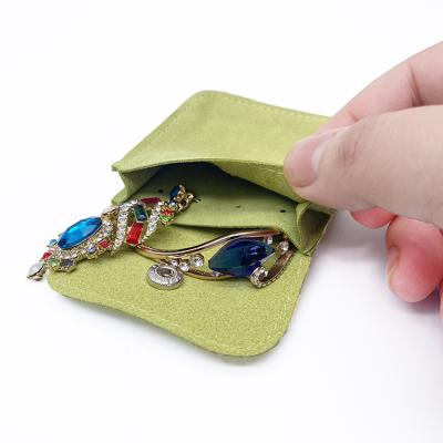 China Simple Modern Custom Made Green Microfiber Pouch Hot Stamped Jewelry Suede Wrap Pouch for sale