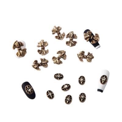 China 2021 New Alloy Metal Vintage Bowknot Accessories Plating Nail Alloy Jewelry Diy Metal Nail Art Decoration for sale