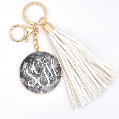 China White Custom Leather Tassel Key Chain Personality Long Metal Gold Stone Leather Tassel Key Chain for sale