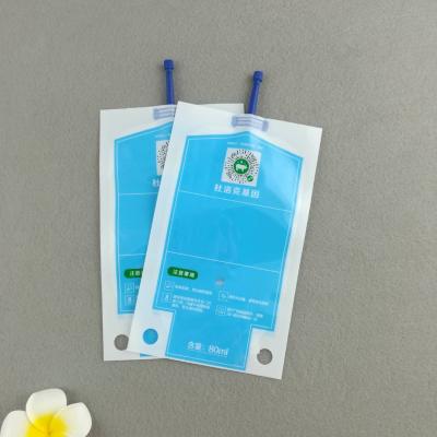 China 80ml 2oz 3oz Recyclable Disposable Flexible Bag With Plastics Nozzle Volume Suitable For Pig Semen Collection Bags Pouches With Tube for sale