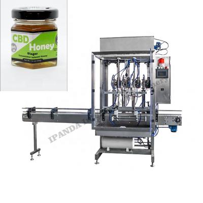 China Glass Jar Honey CLOTHING Packing Machine Honey Liquid Bottling Piston Pump Jar Filling Machine for sale