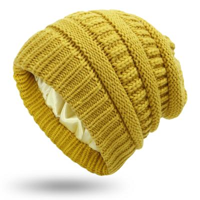 China JOINT latest hot sale personalized satin striping winter knitted hat fashion warm knitted hat for sale