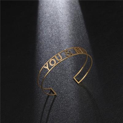 China Hip Hop Stainless Steel Women Personalized Letter Engraved Name Custom Hollow Cuff Bracelet for sale