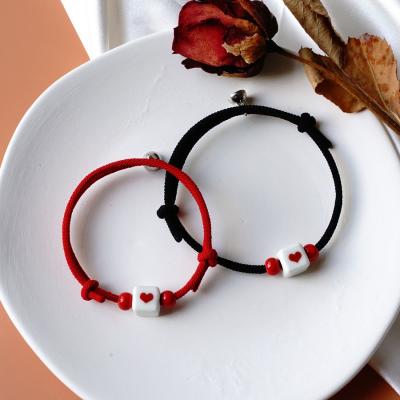 China Red Simplicity Fashion Love Couples Bracelets Magnet Attracts A Pair Of Student Girlfriends Jewelry Bracelet For Lover for sale