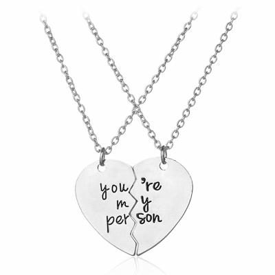 China Ethnic You Are My Person Custom Words Engraved Split Broken Heart Logo Necklace Couples Pendant Necklace for sale