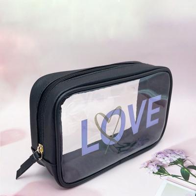 China Hot Selling Travel PVC Waterproof Transparent Cosmetic Bag Waterproof Zipper Clear Heart Makeup Bag For Women for sale