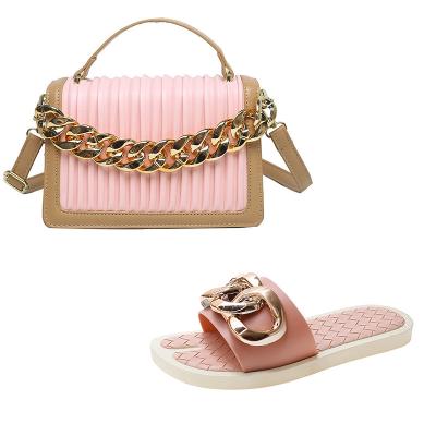 China Newest Waterproof Design Woven Leather Purses and Sandals Sets Flat Sandals Bag Chain Handbags for Women Luxury Purses and Handbag for sale