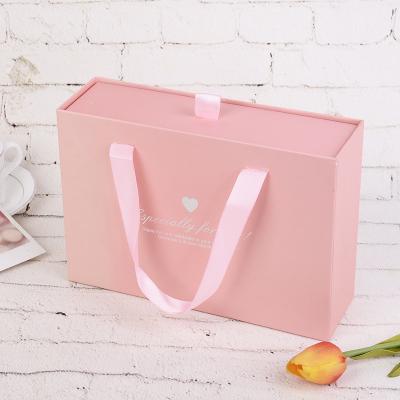 China Recycled Materials Luxury foil stamp logo pink women gift box extra large custom draw paper dress gift box for wedding clothing for sale