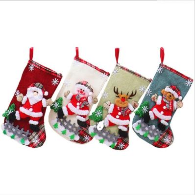 China 2021 hot sale canvas Santa Claus Small Socks Christmas gift bag Santa Claus Elk Fabric Gift Socks Christmas decoration for sale