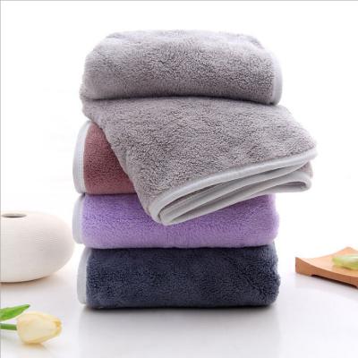 China Soft Coral Absorbent Household Goods Bath Velvet Towel Bathroom Soft Salon Towel Child Safe for sale