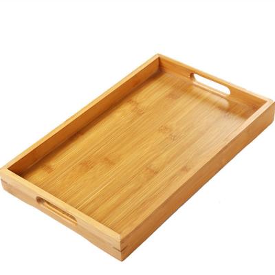 China Viable Wholesale Natural Rectangle Bamboo Wooden Food Serving Tray Set With Handles for sale