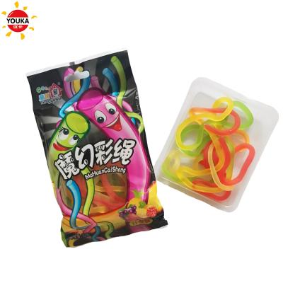 China Natural Blend 32g Fruit Flavor String Gummy Soft Candy Long Whip for sale