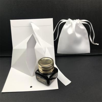 China Recycled Materials Custom Design CMYK Printing Beautiful Makeup Cosmetic Product Jewelry Gift Packaging Boxes With Handle Packaging Box With Pouch for sale