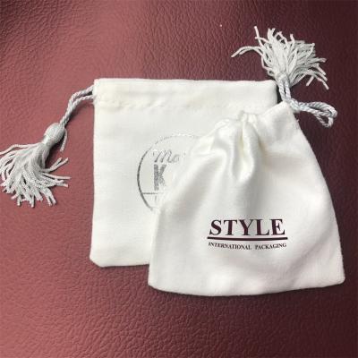 China Velvet /suede VELVET POUCH IN WHITE WITH ROSE GOLD FOIL LOGO WITH WHITE TASSLE TIE TO WEDDING BAG POUCH for sale