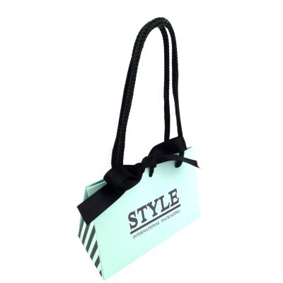 China Recycled Materials Fast Delivery Take Out Tote Bag Flat Handle Carry On Kraft Paper Bag With Your Own Logo And Design for sale