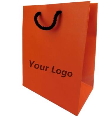 China Recycled Materials Cheap Wholesale Custom Brand Logo Printing Kraft Bag Packaging Gift Paper Bags With Your Own Logo for sale