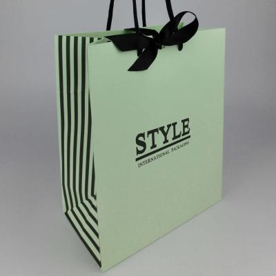 China Recycled Materials Wholesales Custom Logo Printed Hign Quality Recycled Tote Shopping Paper Bag With String Handles With Ribbon for sale