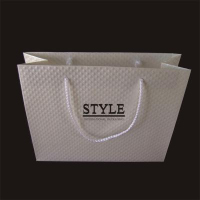 China Handmade Bag White Beige Logo In Black Luxury High Quality Texture Specail Shopping Paper Bag Gift Wrapping Bag for sale