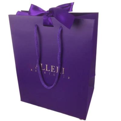 China Recycled Materials Purple Wholesales Custom Logo Printed Hign Quality Recycled Tote Shopping Paper Bag With String Handles With Ribbon for sale