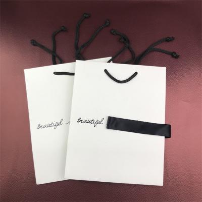 China Recyclable White Kraft Paper Shopping Bag With Your Own Logo for sale