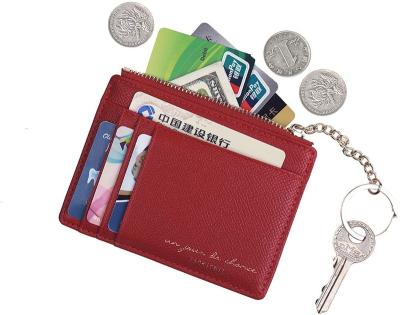 China Hot Selling Retro Lady Card Holder Multicolor Leather Mini Purse Tessel Key Chain Cute Luxury Hot Custom Made Leather Coin Purse for sale