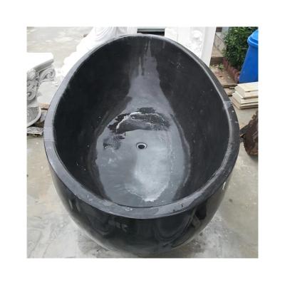 China Customized Size Natural Large Freestanding Stone Maker Marble Soaking Tub Oval With Armrests for sale