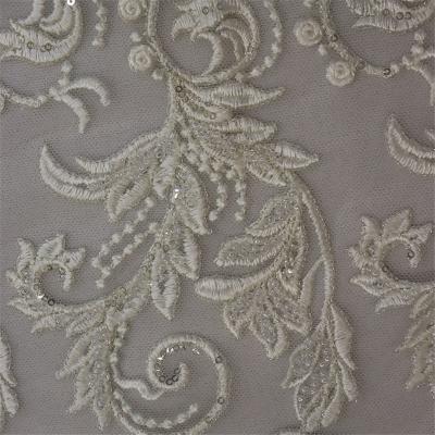 China Viable Most Latest Embroidery Sequin Maid Back Lace Fabric Luxury Bridal Material for sale