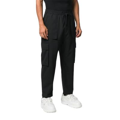 China OEM Men's Anti-wrinkle Polyester Custom Loose Fitness Pants 100% Running Track Sport Cargo Pants With Drawstring for sale