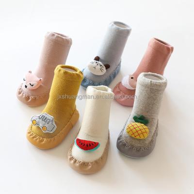 China New COMMON cartoon doll of unique leather baby shoes and socks children for sale