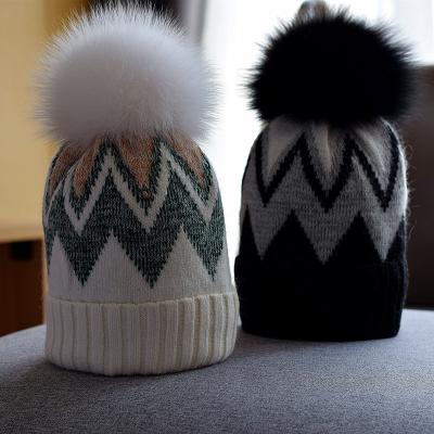 China Real COMMON hot sale fur fox fur ball hat women warm and thick knitted hat in autumn and winter for sale