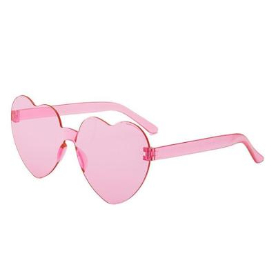 China New Design Ultralight Heart Shaped Sunglasses Women Beach One Piece Eyewear Rimless Gafas De Sol Fashionable Travel Candy Color for sale