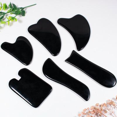 China Hot Selling Black Obsidian Piedra Jade Gua Sha Face Scraper Hand Held Heart Shape Black Obsidian Gua Sha Face Scraper for sale