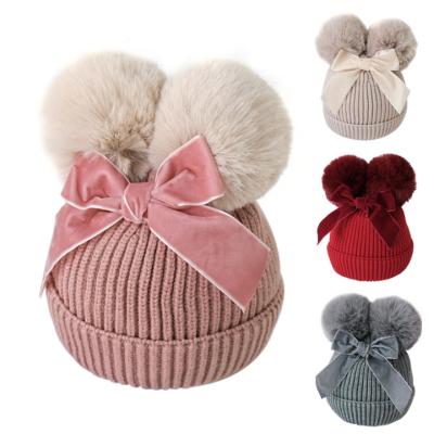 China 9 Colors Winter Baby Checked Hat for Girls Bows Warm Baby Beanie Hat Knitted Baby Hat with Fur Ball Pompom for sale