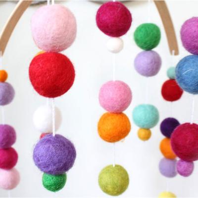 China Soft Toy Handmade Eco Friendly Wool ball baby crib mobile felt baby mobile for babies bed room decor for sale