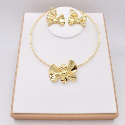 China Beautiful TRENDY High Quality Fashion Jewelry Dubai 18K Gold Bow Necklace Earring Set For Girls NT0166 for sale