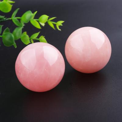 China Europe Wholesale Natural Crystal Healings Lace Magic Rose Quartz Crystal Ball Player Home Decoration for sale