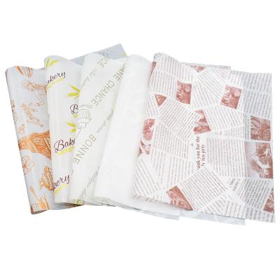 中国 Printed greaseproof paper high quality food grade greaseproof paper raw material,burger wrapping paper in roll 販売のため