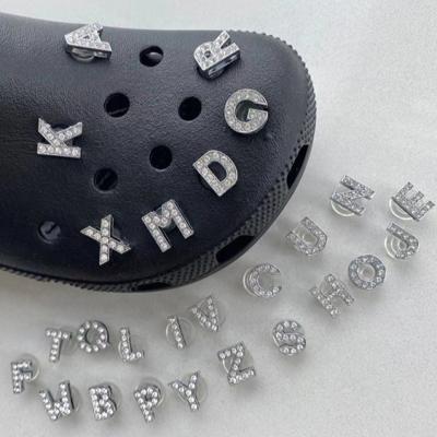 China Clog Charm 2021 Designer Accessories Luxury Metal Letter Clog Charm For Croc Shoe Decoration for sale